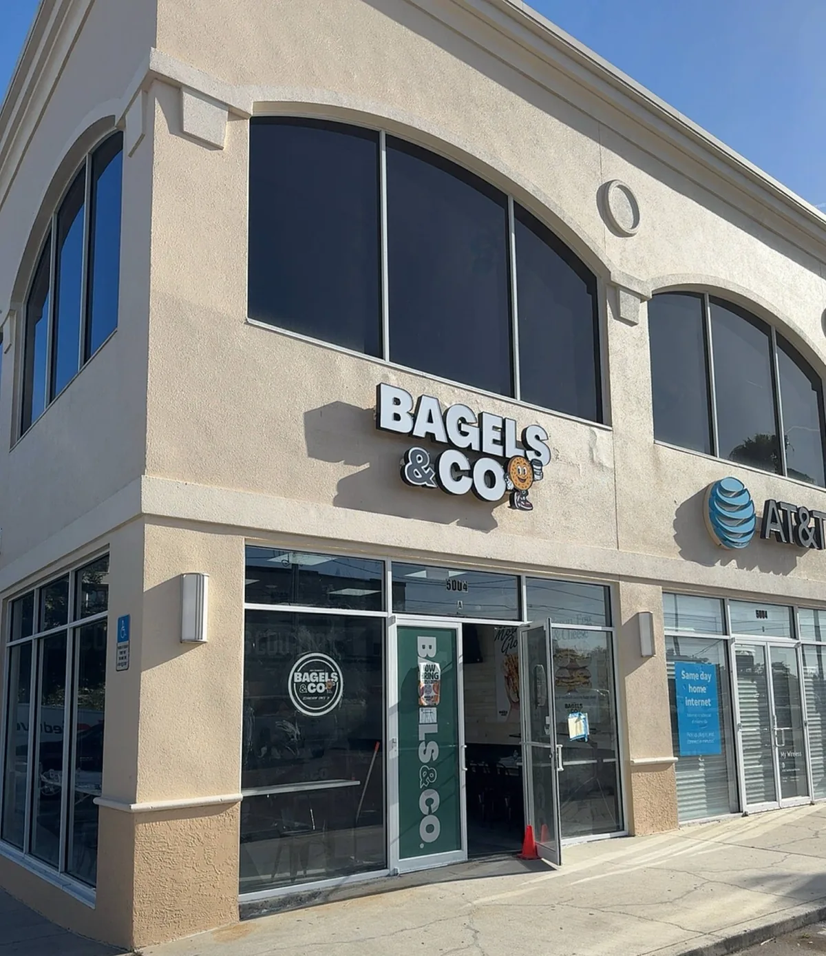 Bagels & Co face-lit channel letters installed on the storefront at 5004 E Fowler Ave in Tampa