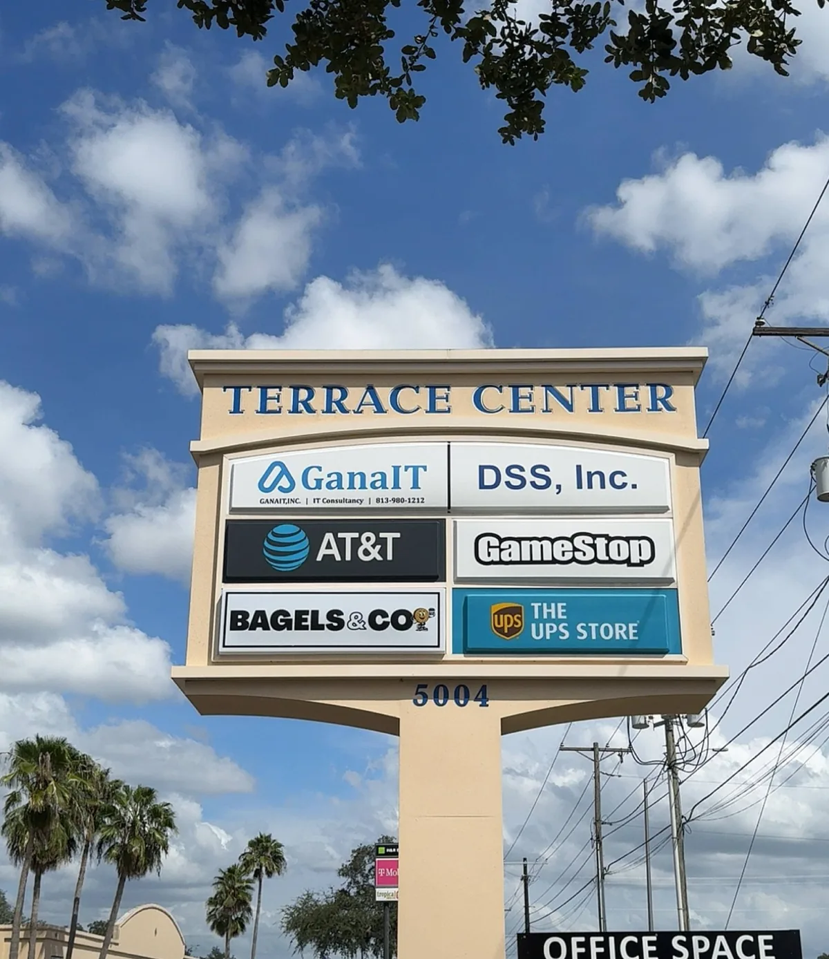 The Terrace Center pylon sign with the new Bagels & Co tenant panel