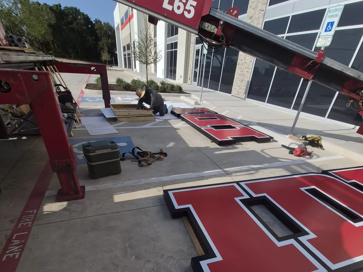 IDI channel letters staged on site before installation