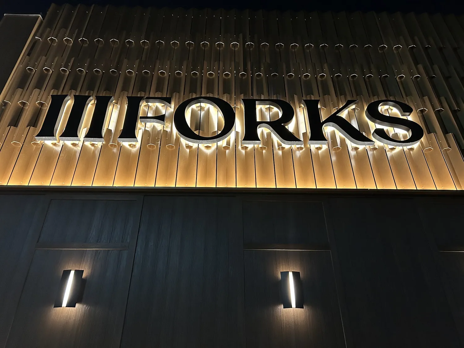 III Forks dimensional letters lit at night