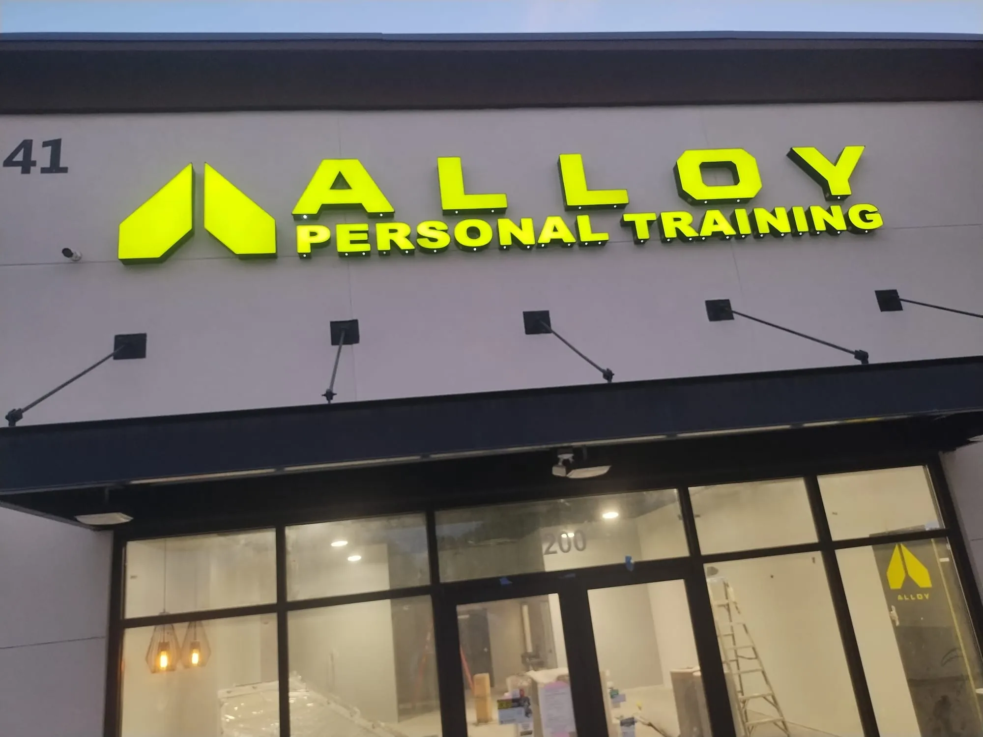 Alloy Personal Training storefront with illuminated channel letters
