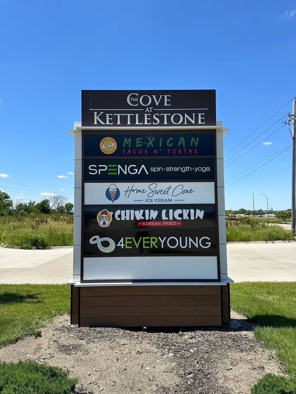 The Cove at Kettlestone multi tenant pylon sign