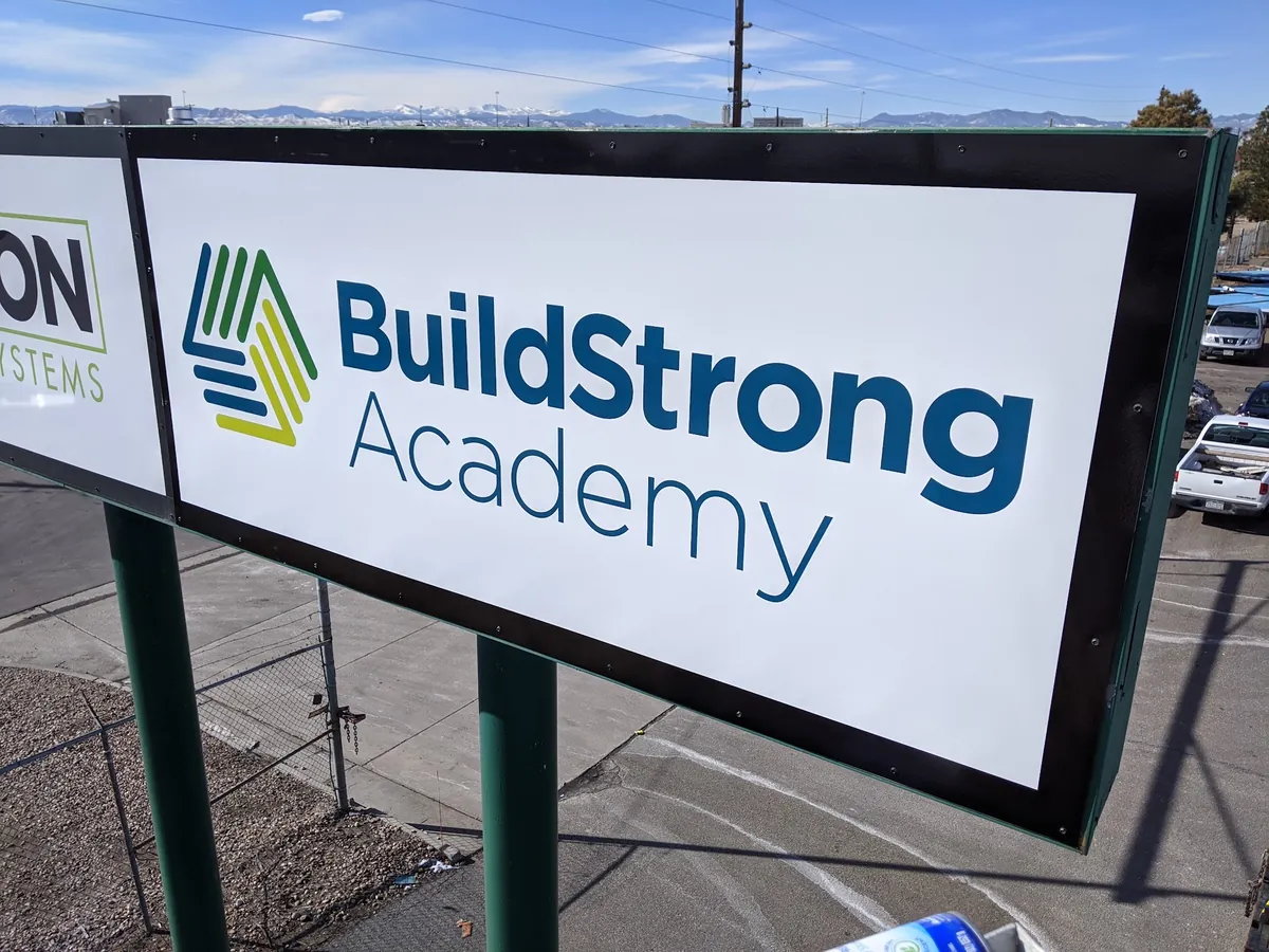 A BuildStrong Academy freestanding sign
