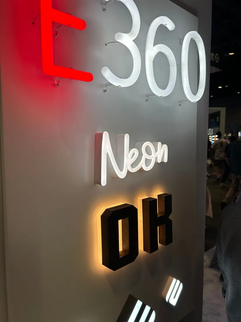 A sample board showing exposed tube neon beside halo lit and face lit letters