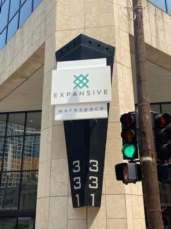 A rebranded storefront sign installed by National Sign Team
