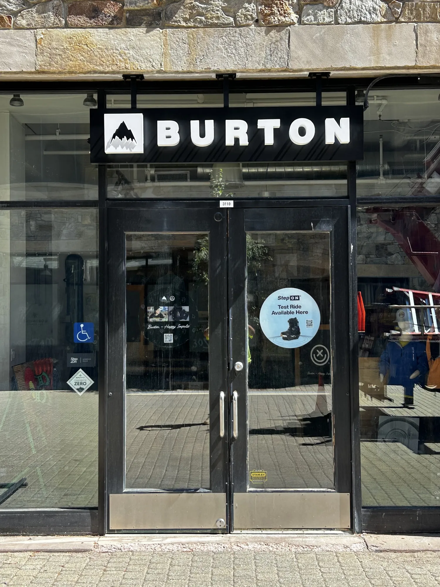 The same Burton storefront after the rebrand with the current Mountain logo cabinet
