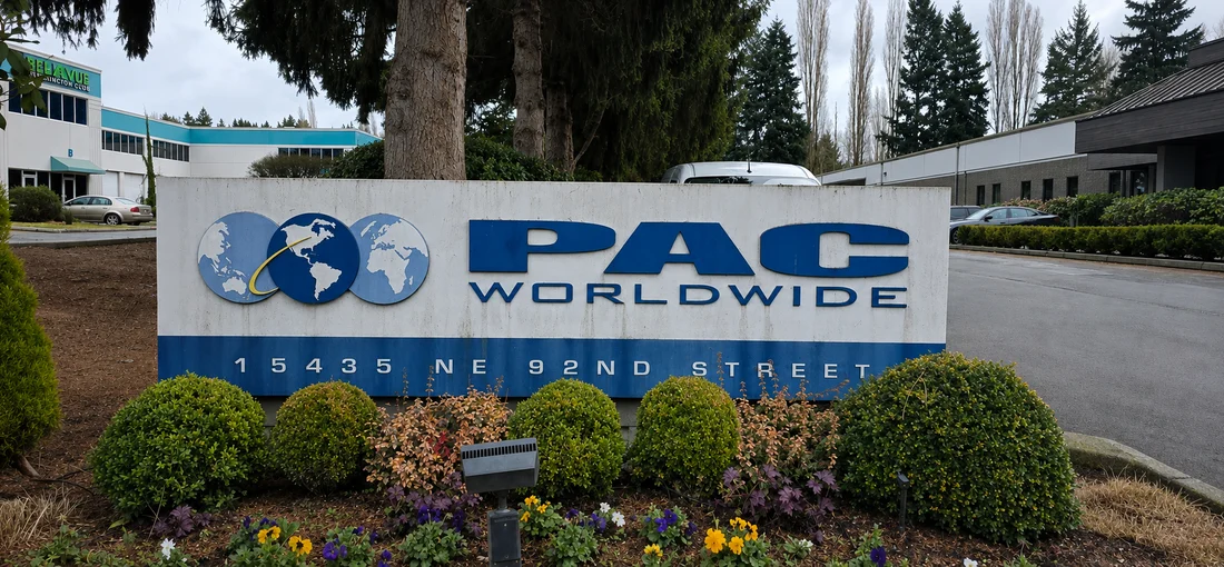 The PAC Worldwide monument sign at the street before the rebrand